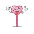 Cute sneaky candy heart lollipop Cartoon character with a crazy face