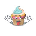 Cute sneaky rainbow cupcake Cartoon character with a crazy face