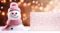 A cute snowman with a blank signboard. Winter holiday banner for Christmas greetings, announcements or promotional text. Royalty Free Stock Photo