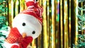 Cute snowman in red hat and bow looks at you from scene. Christmas greeting on gold background. New Year holiday theme
