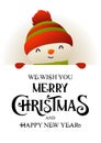 Cute snowman stands behind signboard advertisement banner with text Merry Christmas and Happy New Year Royalty Free Stock Photo