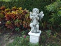 cute statue in the garden Royalty Free Stock Photo