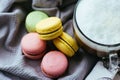 Cute still life with coffee and macaroons.