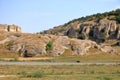 Cute street dog in the mountain landscape with some of the oldest limestone rock formations in Europe, in Dobrogea Gorges Cheile Royalty Free Stock Photo