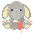 Cute stuffed elephant in paws heart with wings. A soft toy gray elephant as a gift for Valentine's Day. A gift for