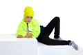 Cute stylish boy posing on staircase