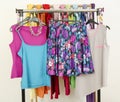 Cute summer outfits displayed on a rack. Royalty Free Stock Photo