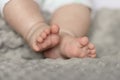 cute sweet baby feet, mother's day, happy motherhood, eco background Royalty Free Stock Photo