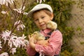 Cute sweet little blond child, toddler boy, playing with little chicks in the park, baby chicks and kid Royalty Free Stock Photo