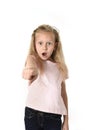 Cute and sweet little girl in disbelief and surprise face expression looking amazed in schock Royalty Free Stock Photo