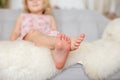 Cute sweet toddler children, tickling feet on the bed, laughing and smiling