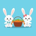 Cute and sweet white bunny rabbits boy and girl with carrot