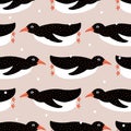 Cute swimming penguins and snowflakes hand drawn vector illustration. Adorable winter birds seamless pattern for kids fabric. Royalty Free Stock Photo