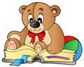 Cute teddy bear reading book Royalty Free Stock Photo