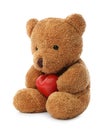 Cute teddy bear with red heart isolated on white. Valentine`s day celebration Royalty Free Stock Photo