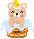 Cute teddy bear taking a bath in wooden tub Royalty Free Stock Photo
