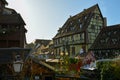 Cute teddy bears attacking old medieval house in Little Venice district in Colmar, France Royalty Free Stock Photo