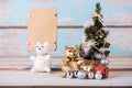 Cute teddy bears and christmas decorations with brown paper for Royalty Free Stock Photo