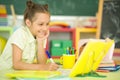 Cute teen girl doing homework in her room Royalty Free Stock Photo