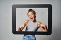 Cute teen girl giving some attitude posing pointing at herself Royalty Free Stock Photo