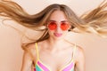 Cute teen woman in a swimsuit with flying hair selective focus Royalty Free Stock Photo