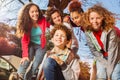 Cute teenage boys and girls rollerblading in city Royalty Free Stock Photo