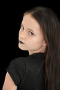 Young girl with black painted lips