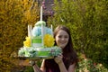 Girl brings birthday cake made of toilet paper Royalty Free Stock Photo