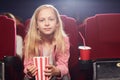 Cute Teenage Girl in Cinema