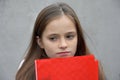 Schoolgirl with exercise books and folders Royalty Free Stock Photo