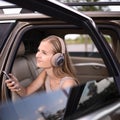 Cute teenage girl listening to her favorite music/ Royalty Free Stock Photo