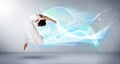 Cute teenager jumping with abstract blue scarf around her Royalty Free Stock Photo