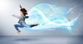 Cute teenager jumping with abstract blue scarf around her Royalty Free Stock Photo