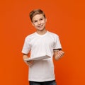 Cute teenager using digital tablet and credit card Royalty Free Stock Photo