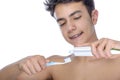 Teen boy wearing braces on white background Royalty Free Stock Photo