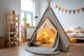 Cute teepee tent in a kids play room Royalty Free Stock Photo