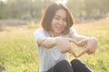 Cute Thai asian girl love heart shape with her hands Royalty Free Stock Photo