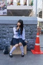 Cute Thai cosplayer dresses as Japanese schoolgirl posing