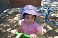 A cute Thai girl sitting in Samphran Elephant Ground & Zoo