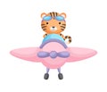 Cute tiger pilot wearing aviator goggles flying an airplane. Graphic element for childrens book, album, scrapbook, postcard,