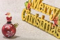 Cute tiny figurine of Santa Claus on a Christmas tree snowflakes Royalty Free Stock Photo