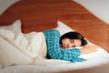 Woman Wearing Pajamas Sleeping in Her Bedroom Royalty Free Stock Photo