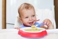 Cute toddler boy eating Royalty Free Stock Photo