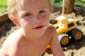 Cute Toddler Boy Playing in the Sand Box Royalty Free Stock Photo