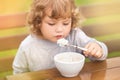 Cute toddler girl having breakfast Royalty Free Stock Photo