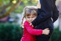 Cute toddler girl hugging older brother. Adorable happy child hugs kid boy. Siblings in love, family and togetherness. Royalty Free Stock Photo