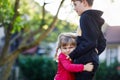 Cute toddler girl hugging older brother. Adorable happy child hugs kid boy. Siblings in love, family and togetherness. Royalty Free Stock Photo