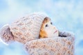 Little cute toddler girl outdoors on a sunny winter day. Royalty Free Stock Photo