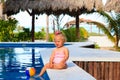 Cute toddler girl playing with ball in swimming Royalty Free Stock Photo