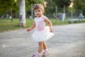 Cute toddler girl playing in sand on outdoor playground. Royalty Free Stock Photo